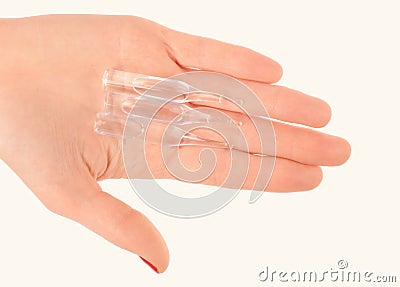 Doctor& x27;s hand holding the medical ampoule Stock Photo