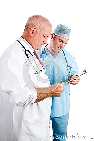 Doctors Consulting Medical Record Stock Photo
