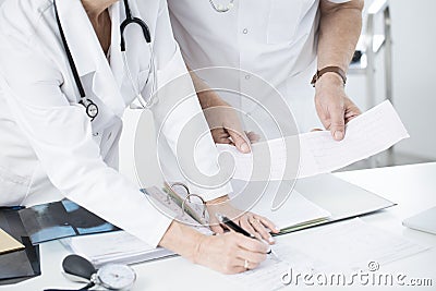 Doctors consulting results Stock Photo