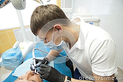 Doctors of the dental surgical department perform a dental surgical operation. Stock Photo