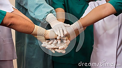 Doctors and nurses coordinate hands. Concept Teamwork Stock Photo