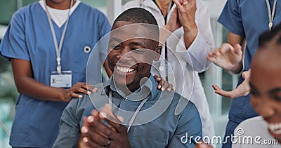 Doctors, teamwork and people applause in hospital for good news, achievement and medical success. Healthcare, clinic and Stock Photo