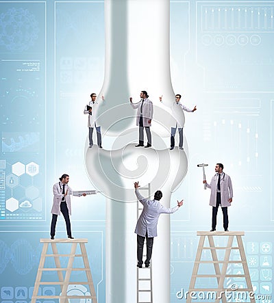 Doctors treating the bone joint Stock Photo