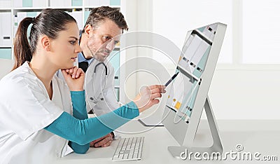 Doctors use the computer, concept of medical consulting Stock Photo