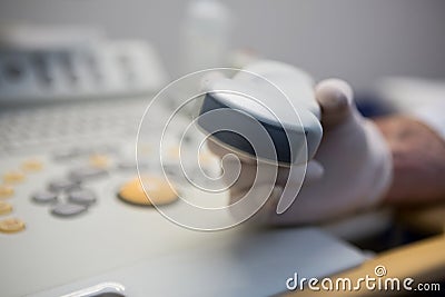 Doctors using sonography machine Stock Photo