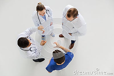 Doctors working with something imaginary at hospital Stock Photo