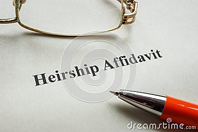 Document about heirship affidavit, glasses and pen. Stock Photo