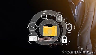Document Management System DMS .Businessman hold folder and document icon.Software for archiving, searching and managing corporate Stock Photo