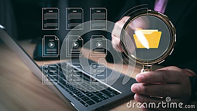 Document Management System DMS, Businessman using digital documents to search. Stock Photo