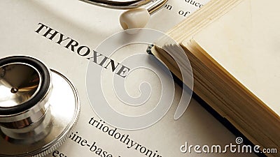 Document with title Thyroxine on a table. Stock Photo