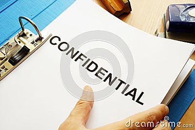 Documents with title Confidential. Stock Photo