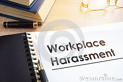 Documents about workplace harassment. Stock Photo