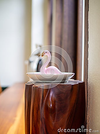 Doflamingo pink swan model blur background Stock Photo
