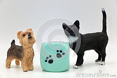 A dog and a cat miniature figurines toys Stock Photo