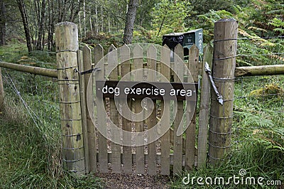 Dog exercise area sign and gate Editorial Stock Photo