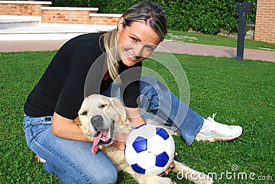 Dog and girl play togheter Stock Photo