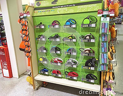 Dog leads or leashes for sale in a pet shop. Editorial Stock Photo