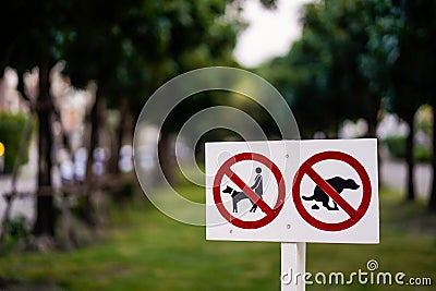 Dog pee and poop sign on Public park. Stock Photo