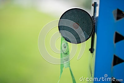 dog poop bags in a park dispenser. plasic waste bags for dog waste Stock Photo