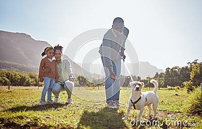 Dog, walking and family relax together in nature park enviroment. Black family, pet and father walk puppy in garden with Stock Photo