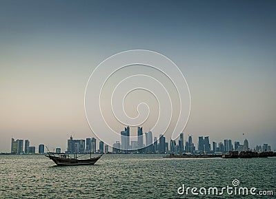 Doha city urban skyline view and dhow boat in qatar Editorial Stock Photo