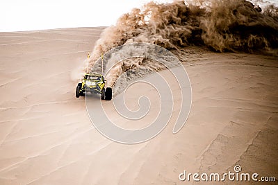 Off road buggy car in the sand dunes of the Qatari desert. Editorial Stock Photo