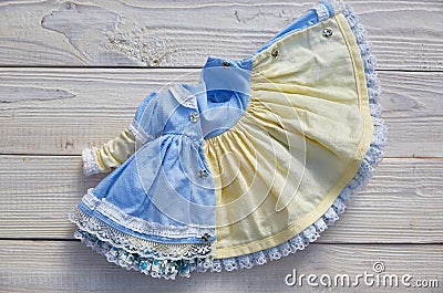 Doll dress on the wrong side. Hobby miniaturism Stock Photo