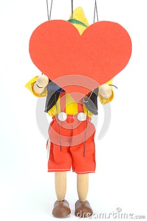 Doll and heart Stock Photo