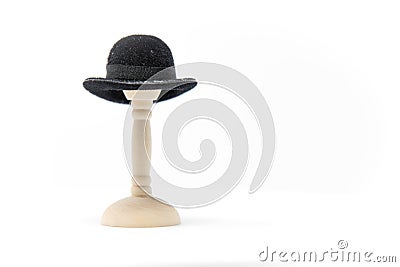 Doll House Fashion Bowler Hat on a small hat stand with a clean Stock Photo