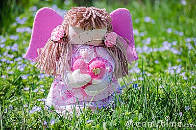 Doll made by hand on a background of nature Stock Photo