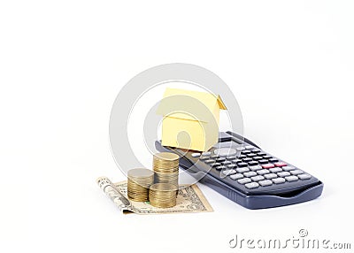 Dollar banknote and coins stack and Home paper on Calculator for Stock Photo