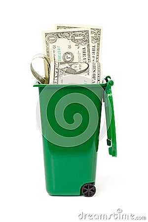 Dollar banknotes in green wheelie bin Stock Photo