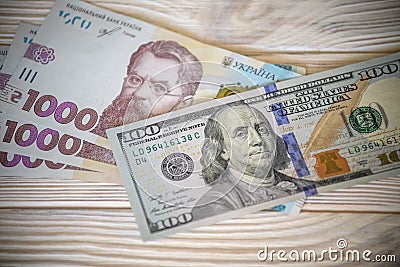 Dollar banknotes of the USA. Amerikan dollars. Money of USA and Ukrainian hryvnia. 1000 Ukrainian hryvnia Stock Photo