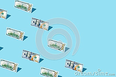 100 dollar bill izometric pattern on bright light blue background. Stock Photo
