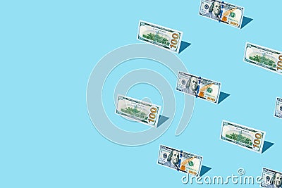 100 dollar bill izometric pattern on bright light blue background. Stock Photo