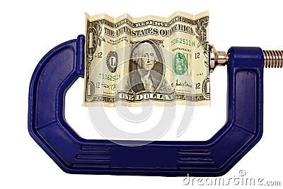 Dollar bill pinched in clamp Stock Photo