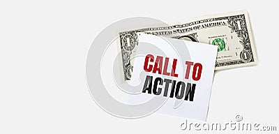 1 dollar bill and white notepad sheet on the white background. CALL TO ACTION text Stock Photo