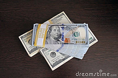 $100 dollar bills stacks - stacks of money on the table Stock Photo