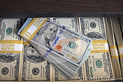 $100 dollar bills stacks - stacks of money on the table Stock Photo