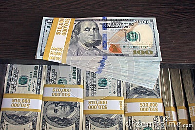 $100 dollar bills stacks - stacks of money on the table Stock Photo