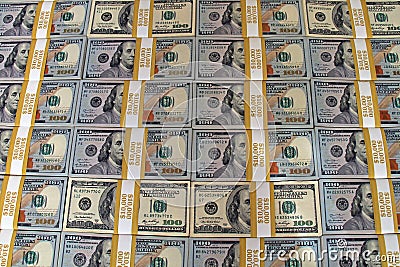 $100 dollar bills stacks - stacks of money on the table Stock Photo