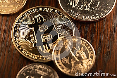 Dollar coins surrounding a Gold Bitcoin. Digital Crypto Currency with US Dollar Coins. Trading and Price of Crypto in USD Editorial Stock Photo