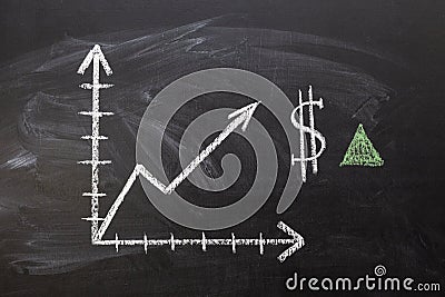 Dollar growth chart drawn on chalkboard Stock Photo