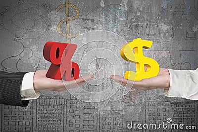 Dollar symbol and percentage sign with two hands Stock Photo