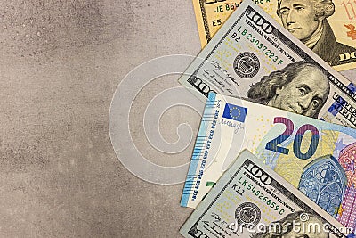 Dollars and Euro, Banknotes, Lots of space for text, Gray table top, Top view, Financial concept Stock Photo