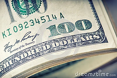 Dollars rolled closeup. American Dollars Cash Money. One Hundred Dollar Banknotes Stock Photo