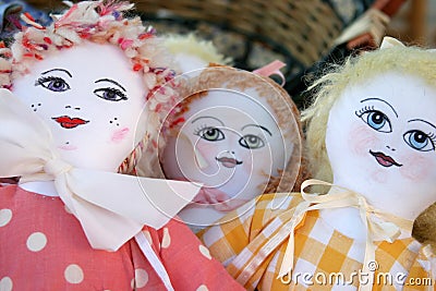 Dolls in a basket Stock Photo