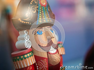 Dolls depicting fairytale hero Nutcracker in window of Moscow Puppet Theater. Tchaikovsky. Buildings opposite are reflected Editorial Stock Photo