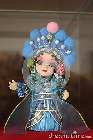 Dolls dress with Chinese uniform. Stock Photo