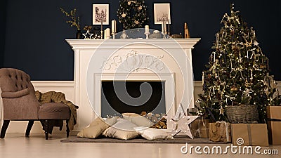 New Year`s Eve. Happy new year and christmas. A cozy room with fireplace, there is a Christmas tree decorated with toys Stock Photo